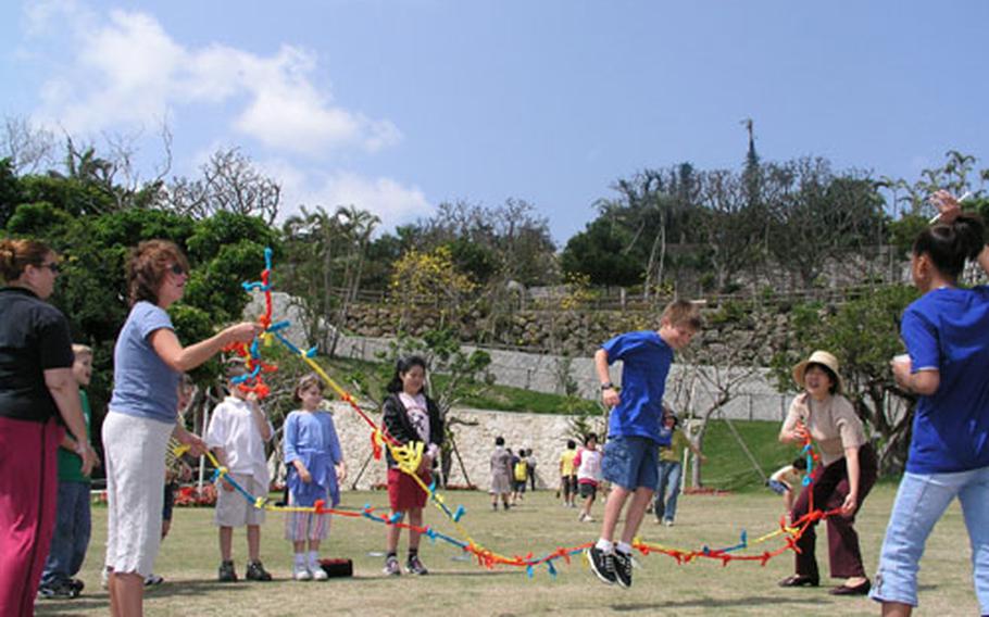Third graders from Kadena Elementary School and Shimabukuro Elementary School in Okinawa City recently shared some fun time together at the Okinawa Zoo.